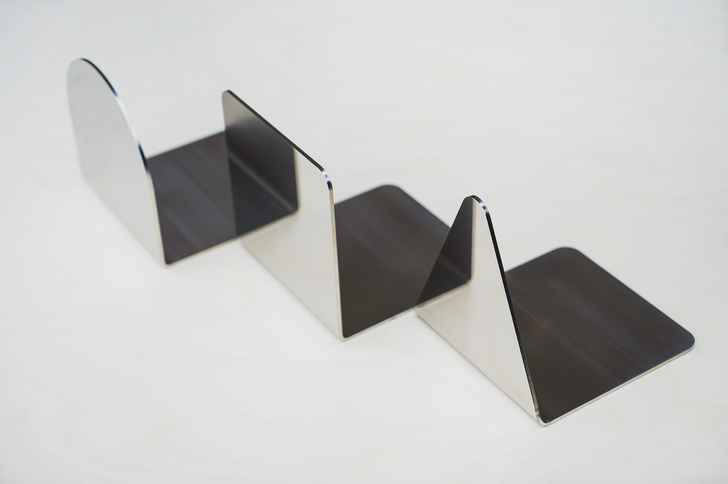 Polished steel bookend - B E N T