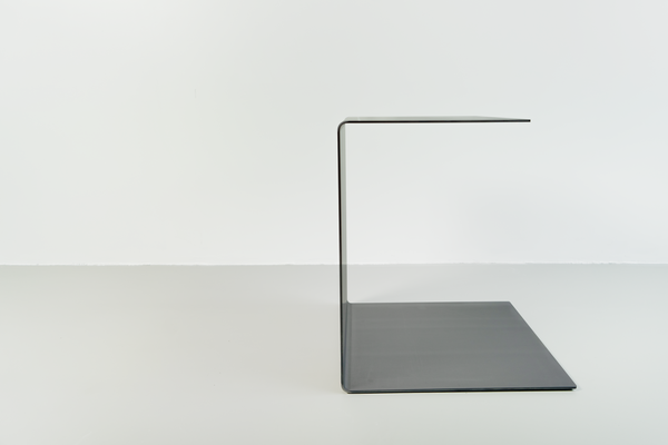 Polished steel side table